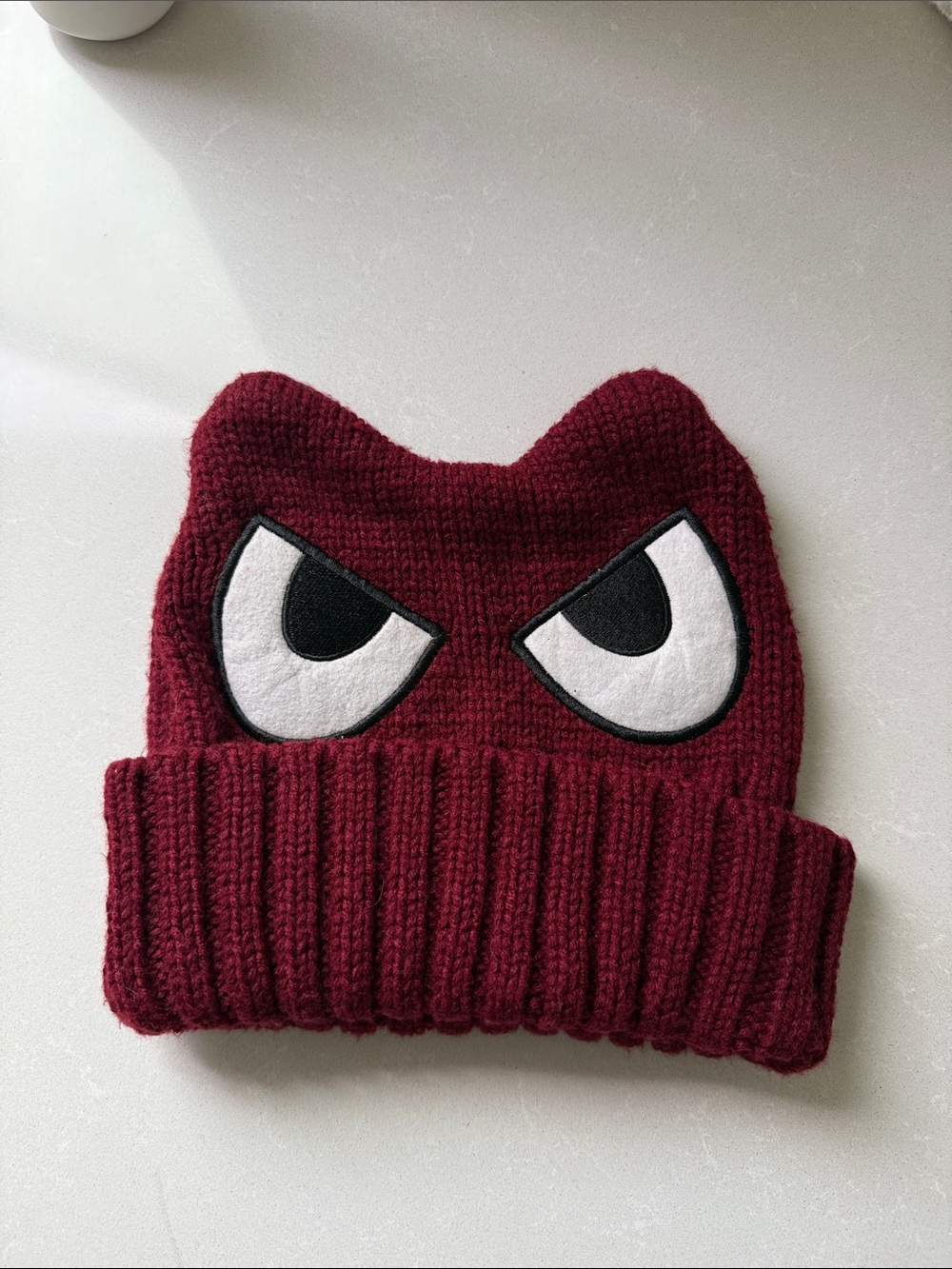 Burgundy Knit Beanie with Playful Eyes